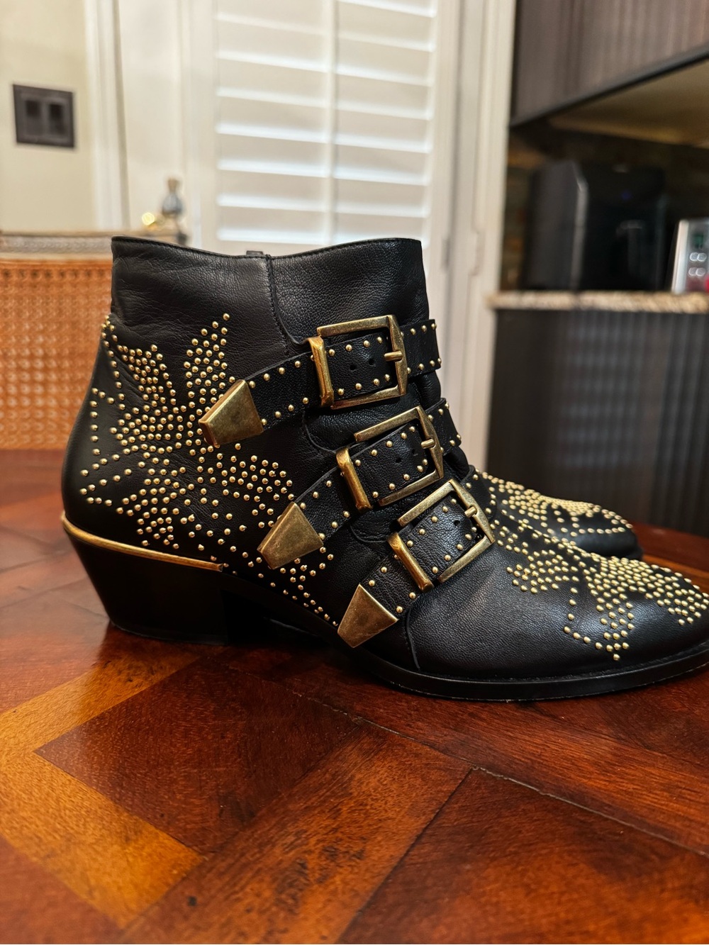 Chloe Black Leather Ankle Boots with Gold Stud and Buckle Detail